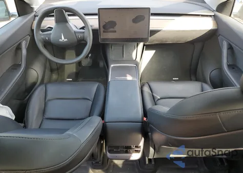 2022 Tesla Model Y from USA, damaged, VIN 7SAYGDEE9NF447853